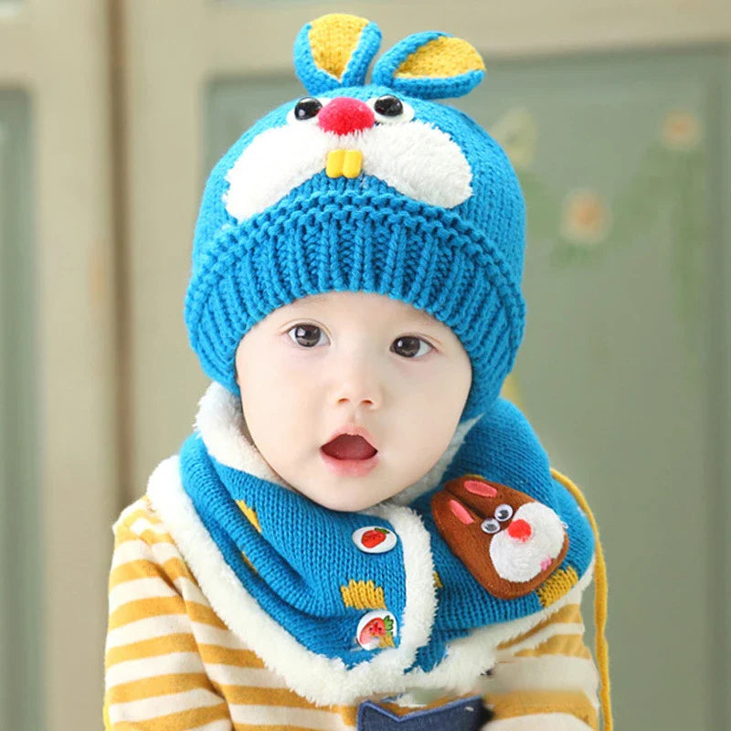 A soft, premium woolen hat for babies with a charming cartoon pattern, keeping them warm and cozy during cold weather.