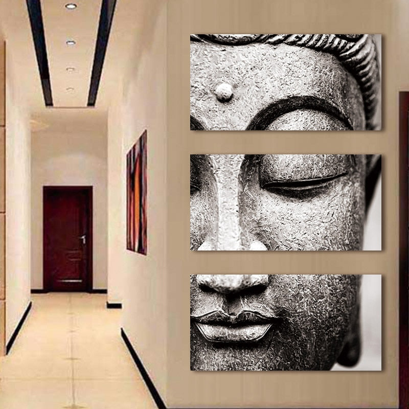 Serene 3-panel Buddha canvas wall art with a detailed, monochrome image of the Buddha's face