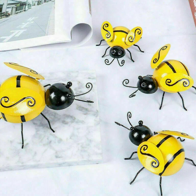 Decorative metal bumble bee garden ornament in a modern, nature-inspired design