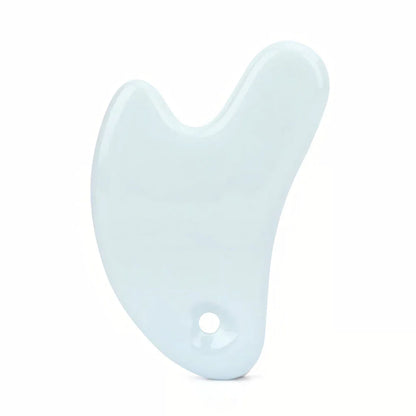 Ceramic Gua Sha Face Massager in various colors - Pink, Blue, and White - for skin rejuvenation and relaxation