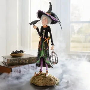 Enchanting Witch Figurine, a captivating tabletop decoration for Kiwi Halloween celebrations