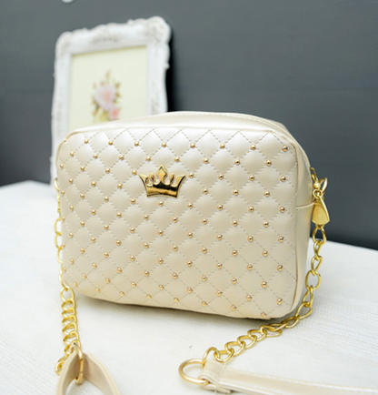 Chic women's fashion purse made of premium PU leather with diamond stitching and gold studs