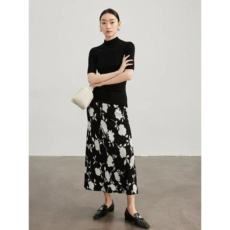 Elegant floral jacquard woollen knit skirt in a mid-calf length, designed for warmth and style during New Zealand's chilly winters.