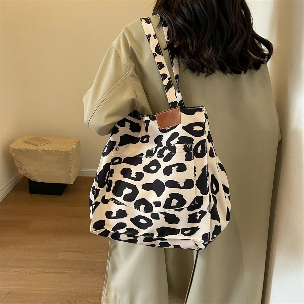 Oversized leopard print canvas shoulder bag with ample storage and stylish design, perfect for Kiwi women
