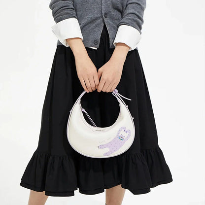 Stylish and functional Half Moon Bag in a chic pink colour, perfect for the modern Kiwi consumer