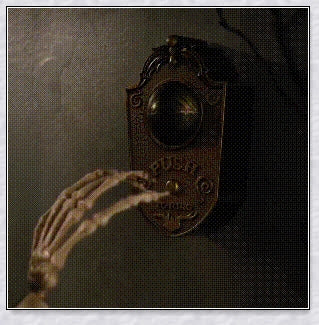 Animated Halloween doorbell with a pop-up green eyeball that glows and turns to frighten guests