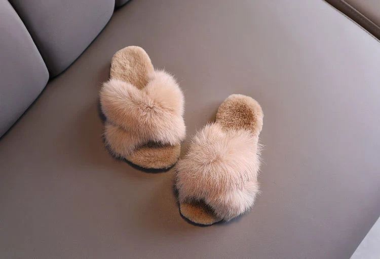 Stylish and comfortable cotton slippers with a unique cross-strap design and an eco-friendly rubber sole, available in a variety of Kiwi-inspired colours.