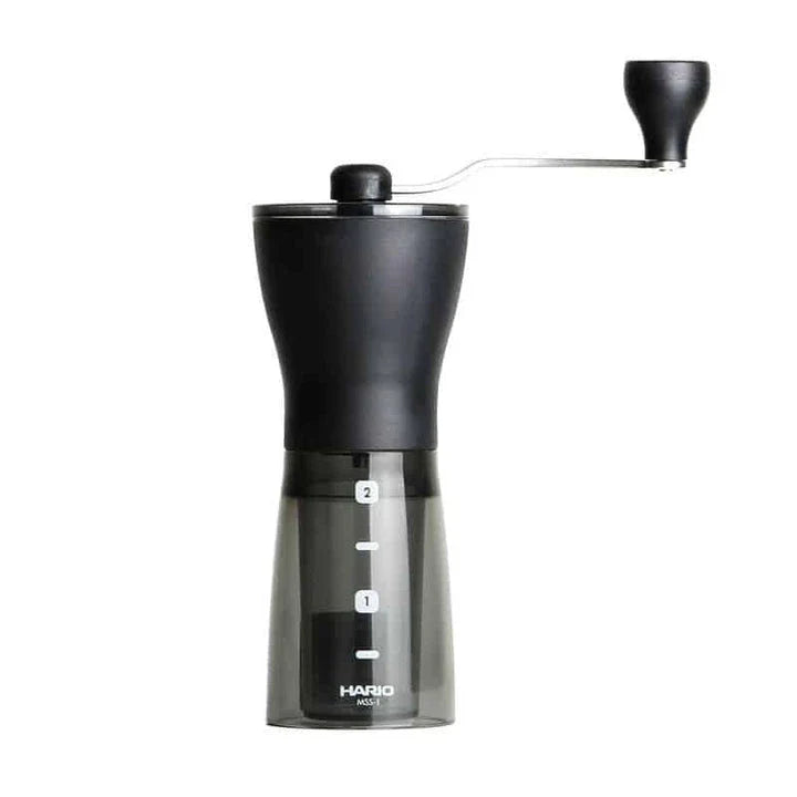 Trendy Coffee Grinder in Black and Red - A manual coffee grinder with precision ceramic burrs for a consistent grind and elevated coffee experience