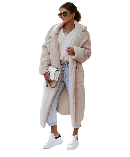 Stylish women's long fur coat with an irregular single-breasted design, available in a range of classic Kiwi-inspired colours