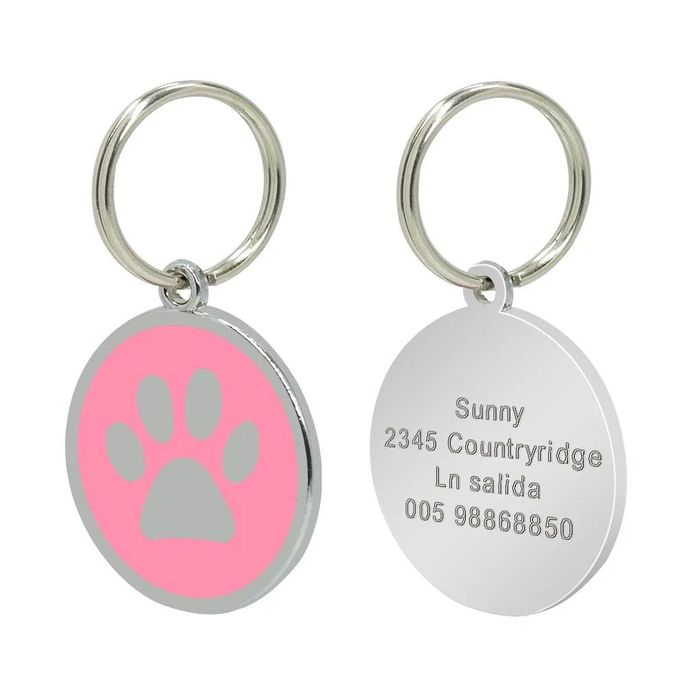 Premium stainless steel dog ID tag with a unique paw print pattern, designed for the active Kiwi lifestyle