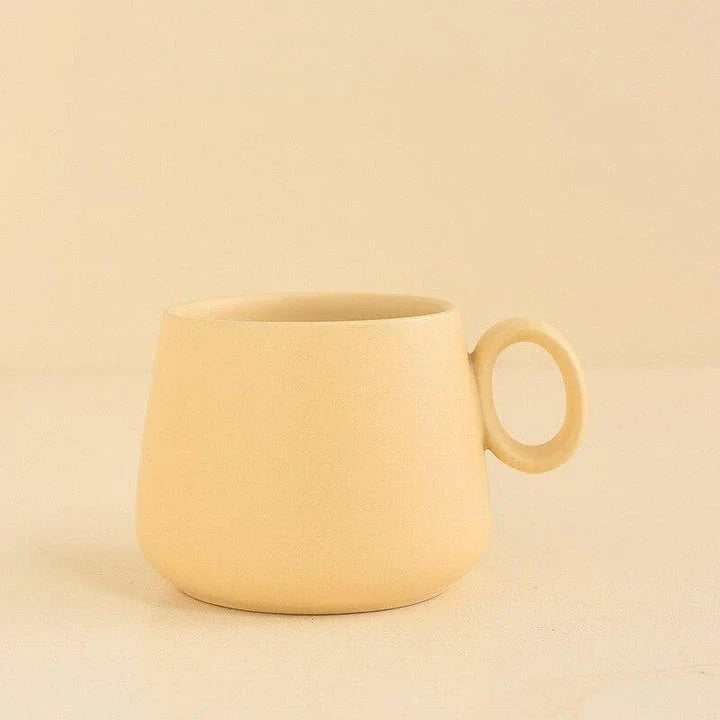 Pastel green ceramic coffee mug with a Kiwiana-inspired design, perfect for daily use in New Zealand homes and cafes.