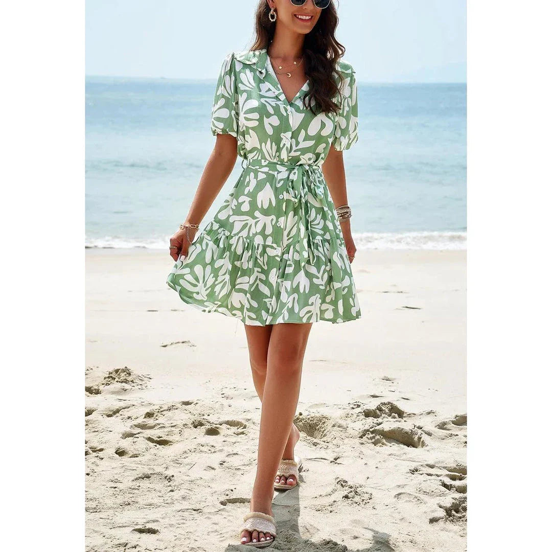 Elegant women's printed dress with short sleeves, ideal for spring and summer in New Zealand