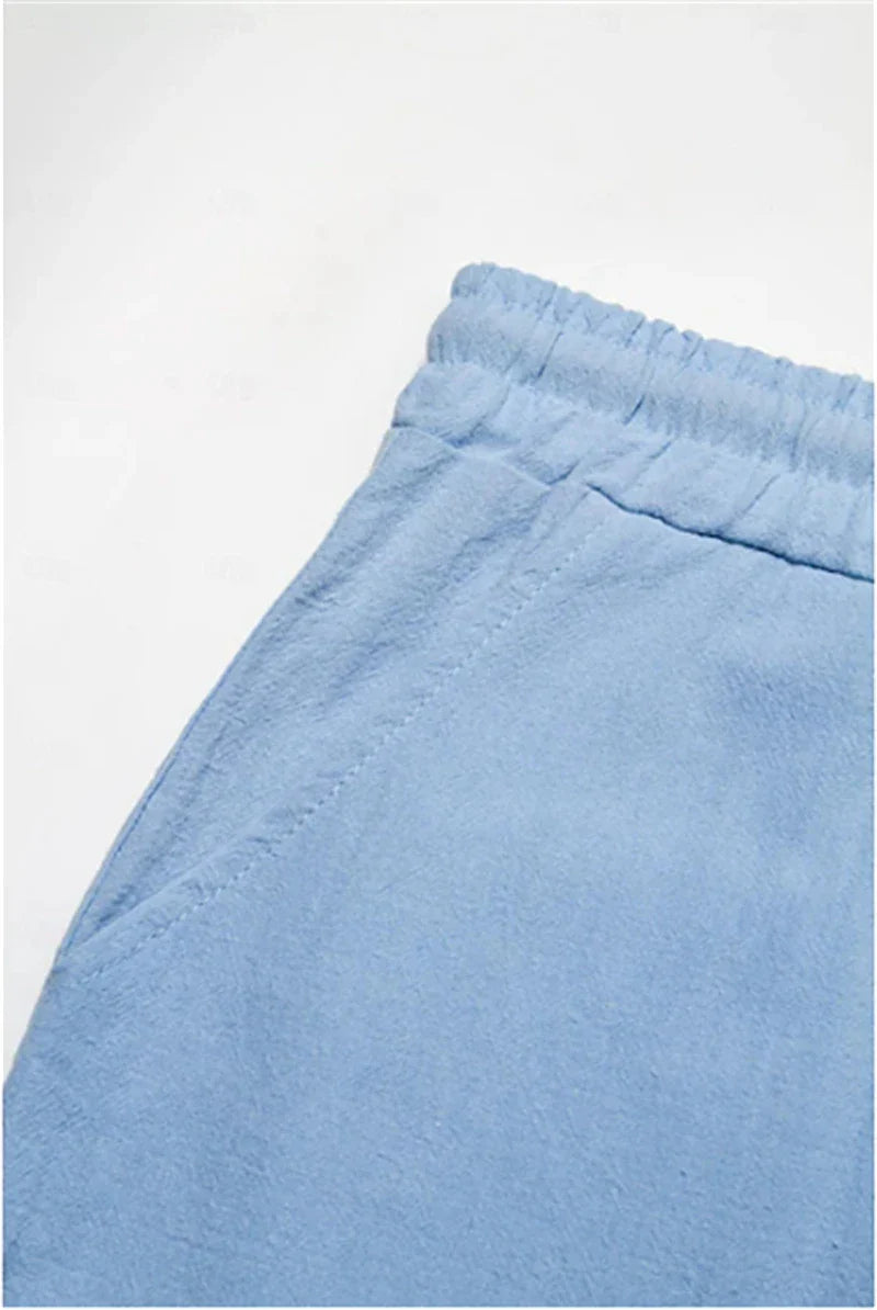 Cotton linen shorts with drawstring elastic waist and straight leg, available in various colors for casual summer style