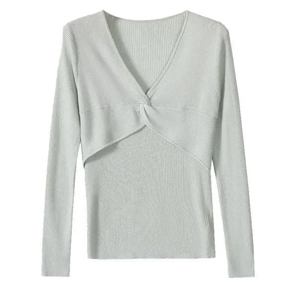 A stylish V-Neck jumper in dark grey, featuring a unique criss-cross design and a flattering slim fit for the modern Kiwi woman.
