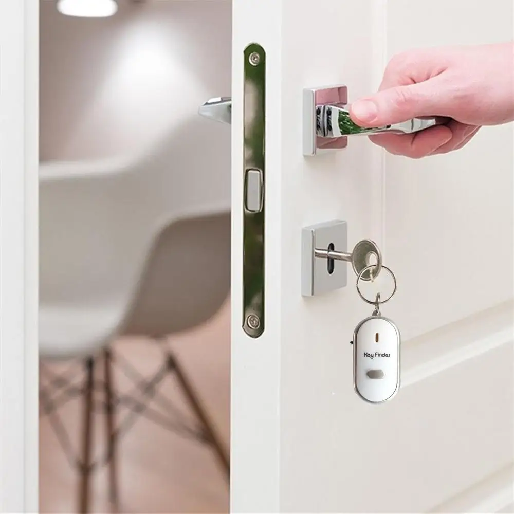 Whistle-activated key finder with beeping alarm and flashing LED lights to help locate lost keys in NZ homes and offices