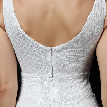 Sophisticated V-neck evening dress in white, black, and gold colours for formal events and parties in New Zealand