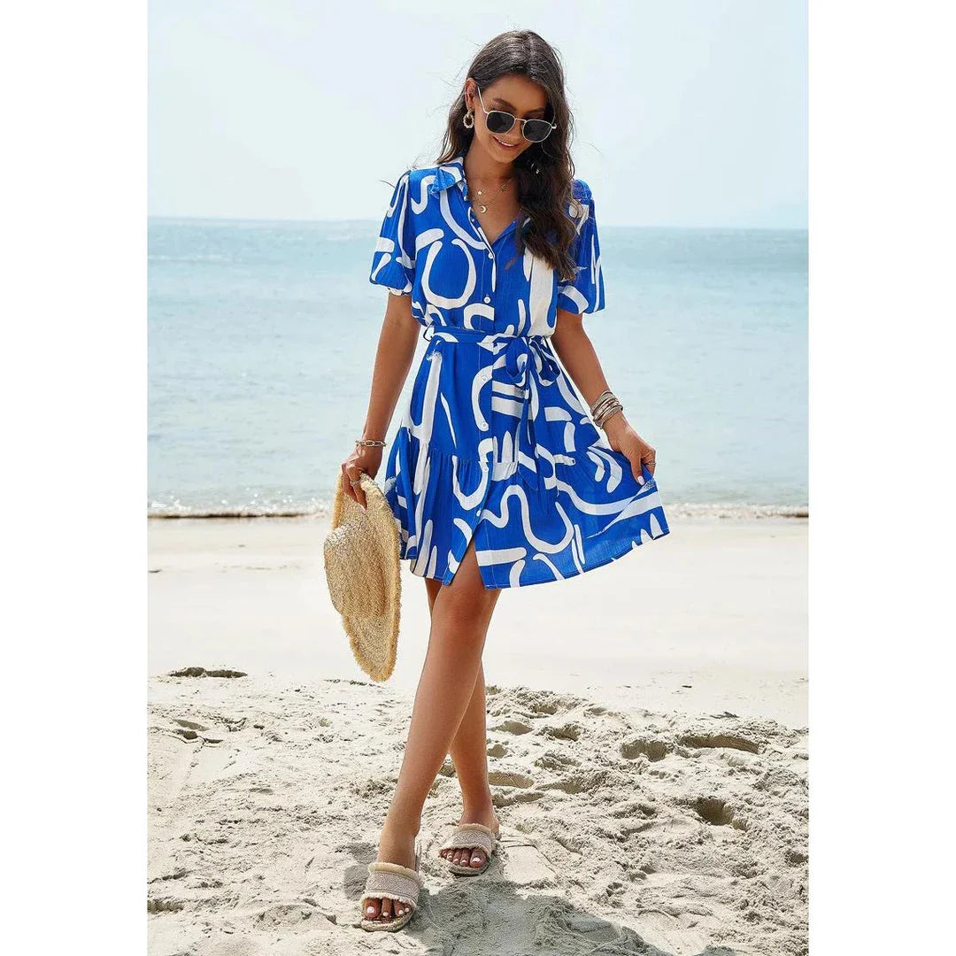 Elegant women's printed dress with short sleeves, ideal for spring and summer in New Zealand