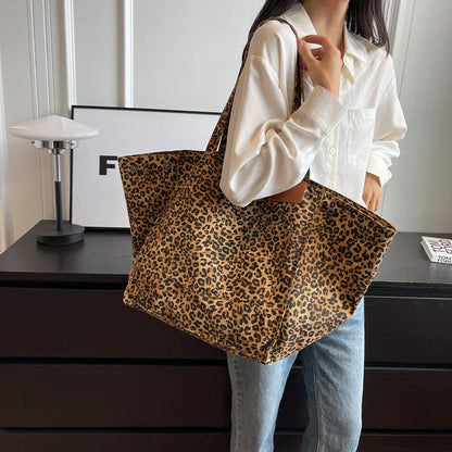 Oversized leopard print canvas shoulder bag with ample storage and stylish design, perfect for Kiwi women