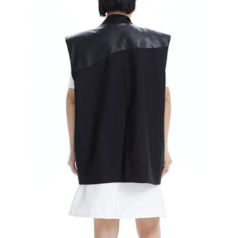 Stylish wide-shoulder PU leather patchwork waistcoat in a modern, three-dimensional design