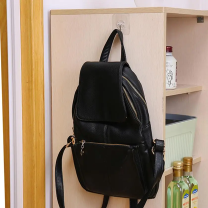 A set of 12 transparent wall hangers that can hold a variety of household items in the bathroom, kitchen, and other rooms