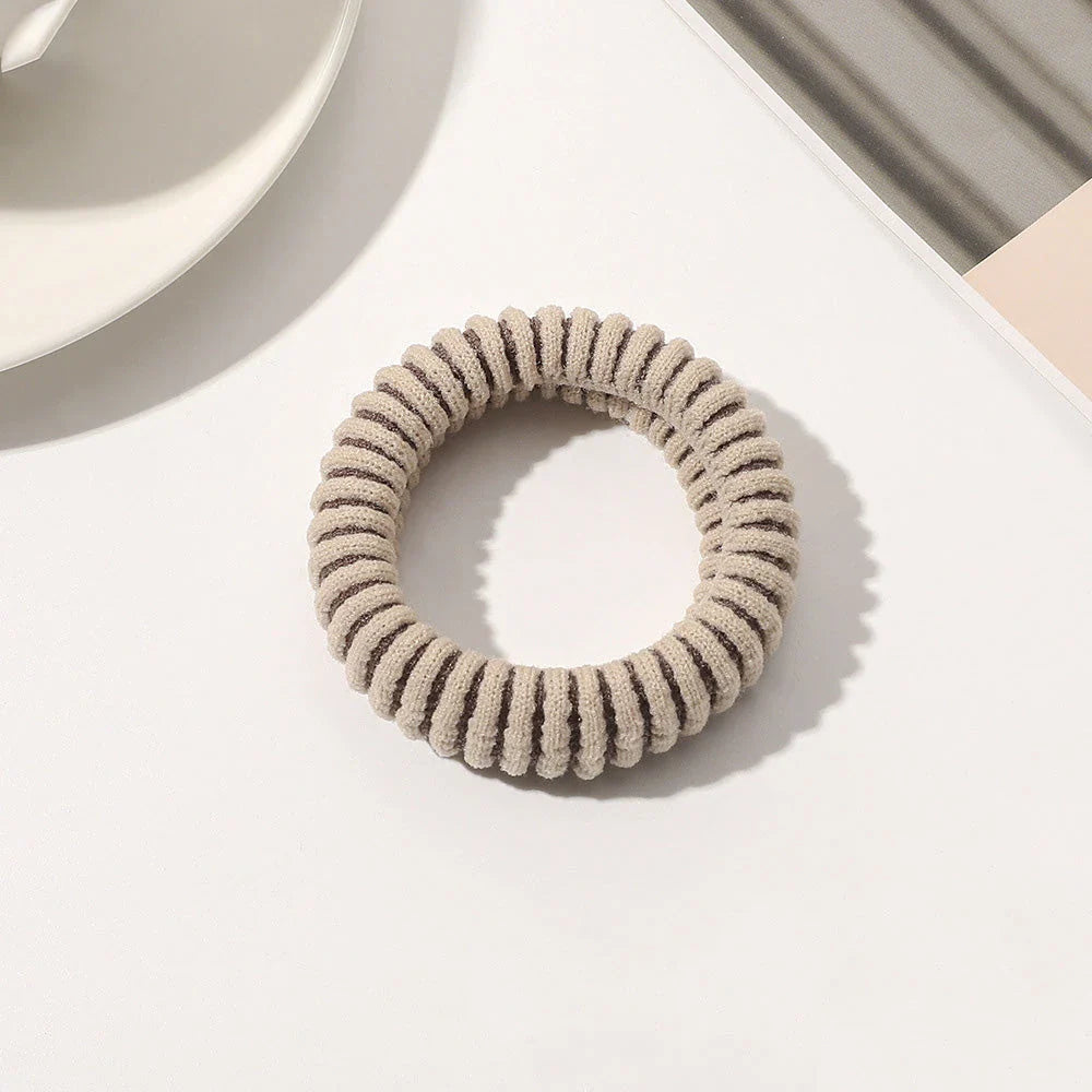 Stylish knitted lattice hair scrunchies in a black and white striped pattern, perfect for Kiwi women's hair accessories