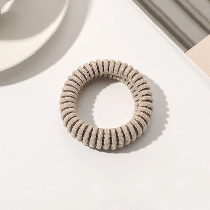 Stylish knitted lattice hair scrunchies in a black and white striped pattern, perfect for Kiwi women's hair accessories