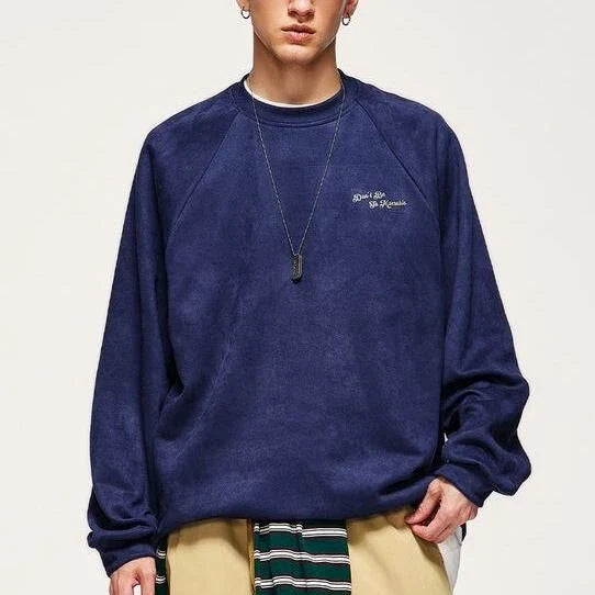 Cosy embossed faux-suede long-sleeve tee in blue, featuring a unique texture for added sophistication and all-day comfort.