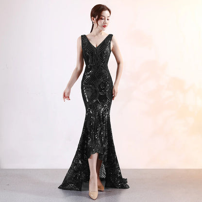 Sophisticated V-neck evening dress in white, black, and gold colours for formal events and parties in New Zealand