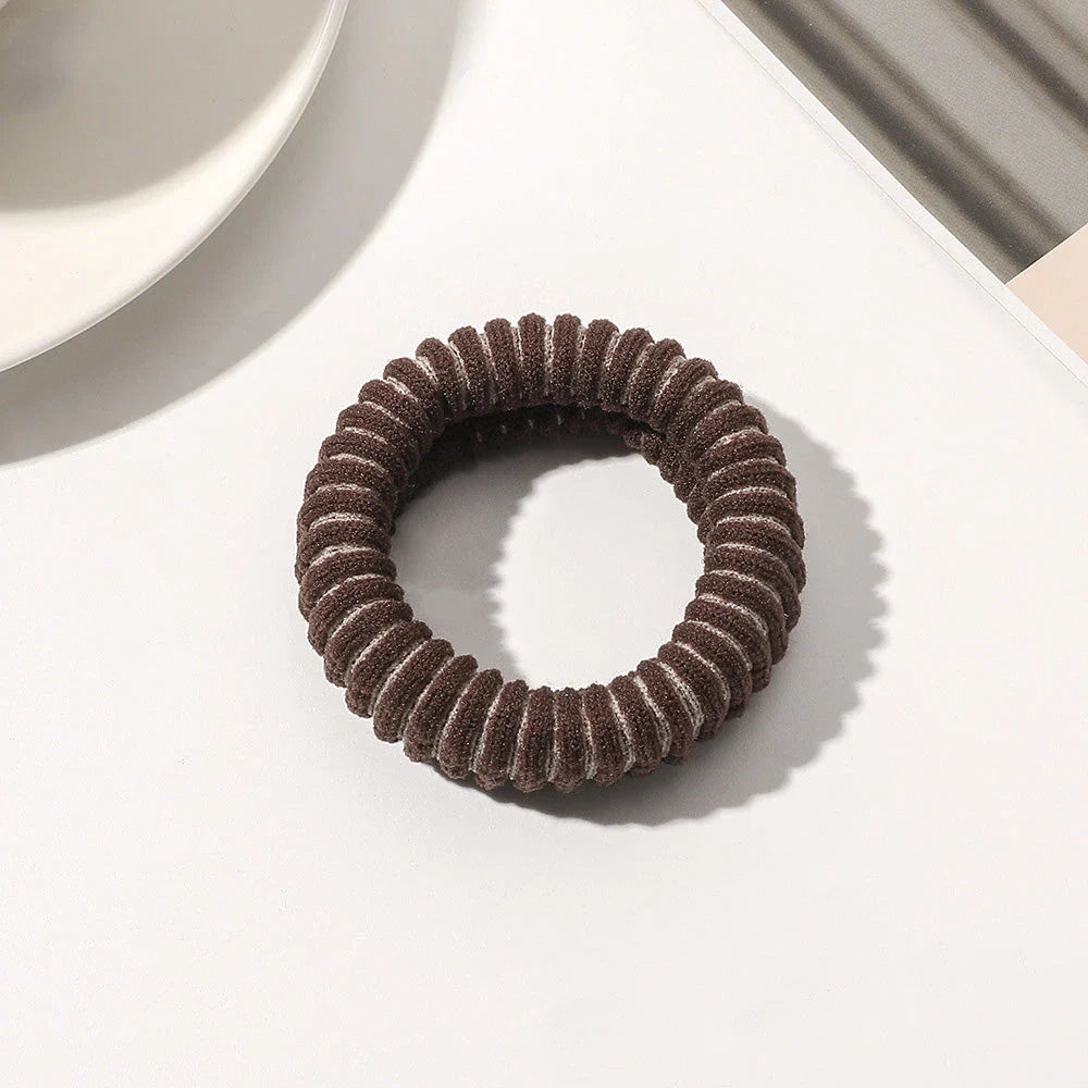 Stylish knitted lattice hair scrunchies in a black and white striped pattern, perfect for Kiwi women's hair accessories