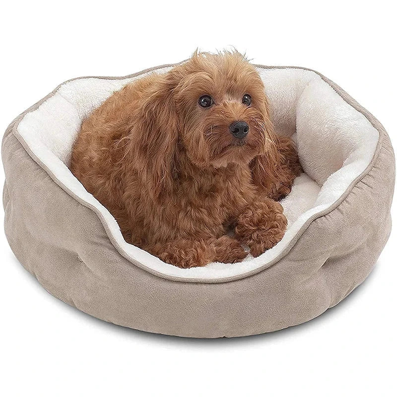 Cozy round small pet bed in beige color with soft microfiber fleece material and non-slip bottom