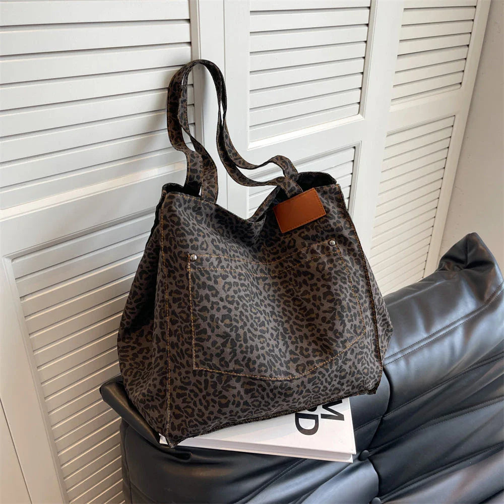Oversized leopard print canvas shoulder bag with ample storage and stylish design, perfect for Kiwi women