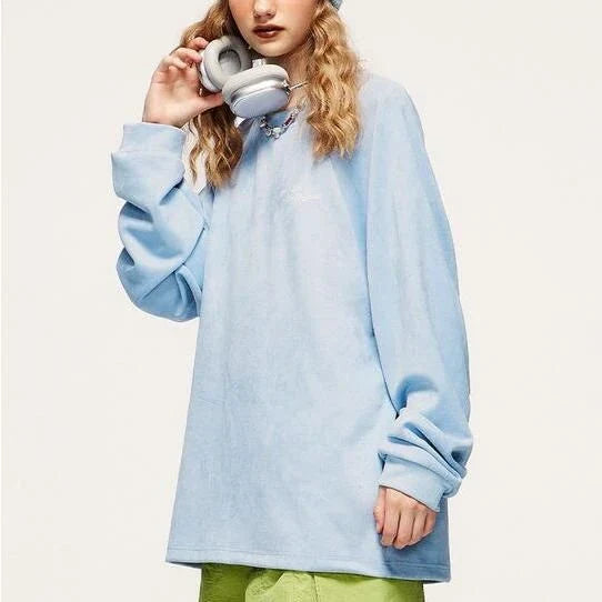 Cosy embossed faux-suede long-sleeve tee in blue, featuring a unique texture for added sophistication and all-day comfort.