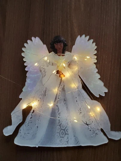 Glowing golden angel doll Christmas tree topper with intricate design, perfect for adding festive cheer to any Kiwi holiday display