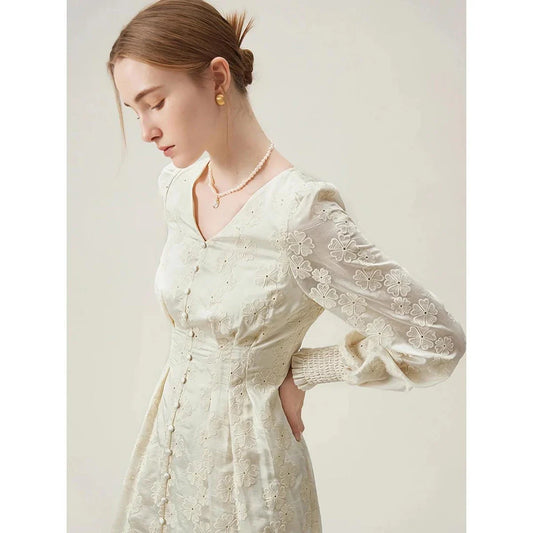 A long-sleeved jacquard dress in beige with a vintage-inspired, romantic design and a comfortable, flattering fit.