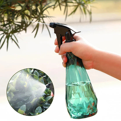 A sleek, 1000ml diamond-patterned watering can with a transparent body for easy water level monitoring