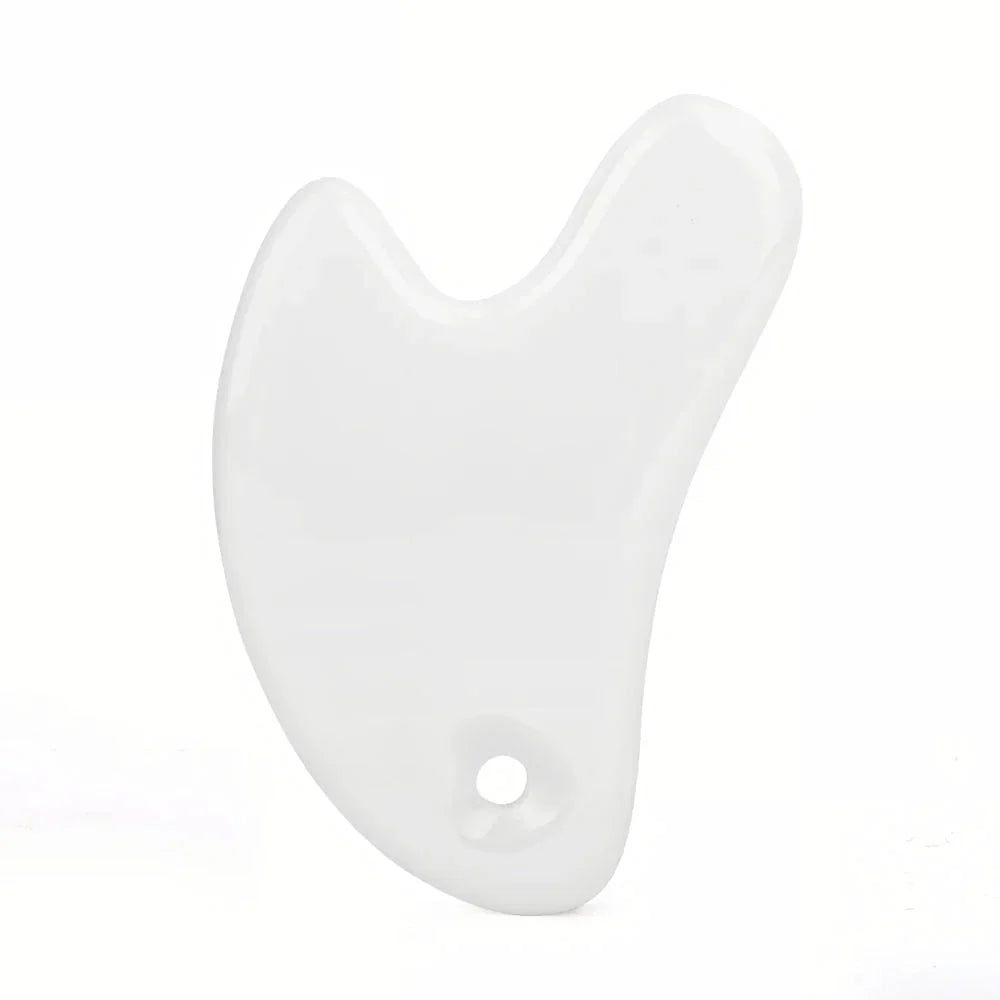 Ceramic Gua Sha Face Massager in various colors - Pink, Blue, and White - for skin rejuvenation and relaxation