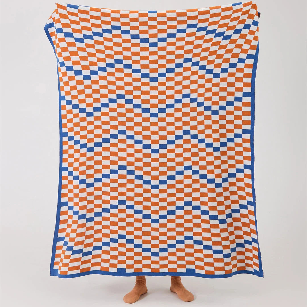 Cozy Kiwi Plaid Blanket in blue, perfect for home, travel, and outdoor use with its soft cotton construction and vibrant design