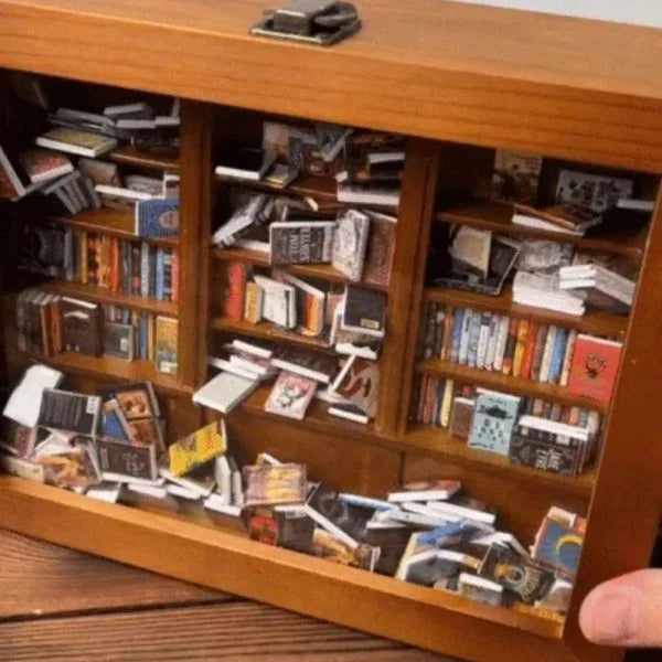 Compact wooden bookshelf toy with paper 'books' for anxiety relief and mindfulness, made in New Zealand