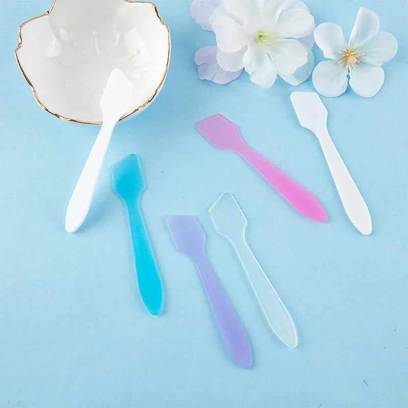 10 Pcs Mini Cosmetic Spatulas in various colours for precise application of face creams and masks