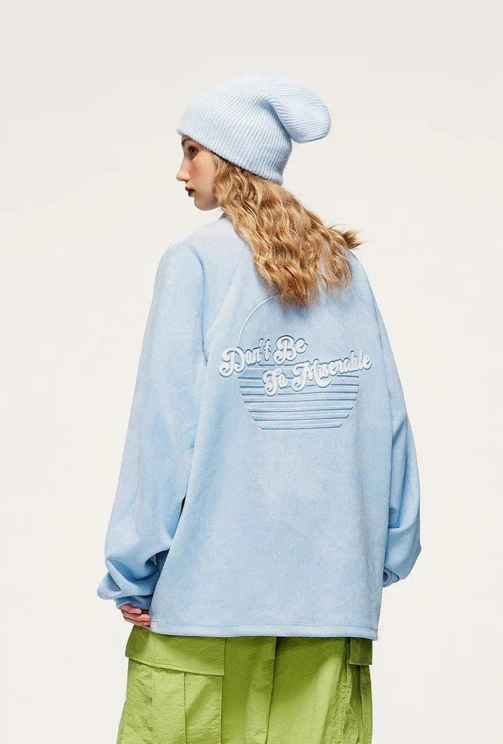 Cosy embossed faux-suede long-sleeve tee in blue, featuring a unique texture for added sophistication and all-day comfort.