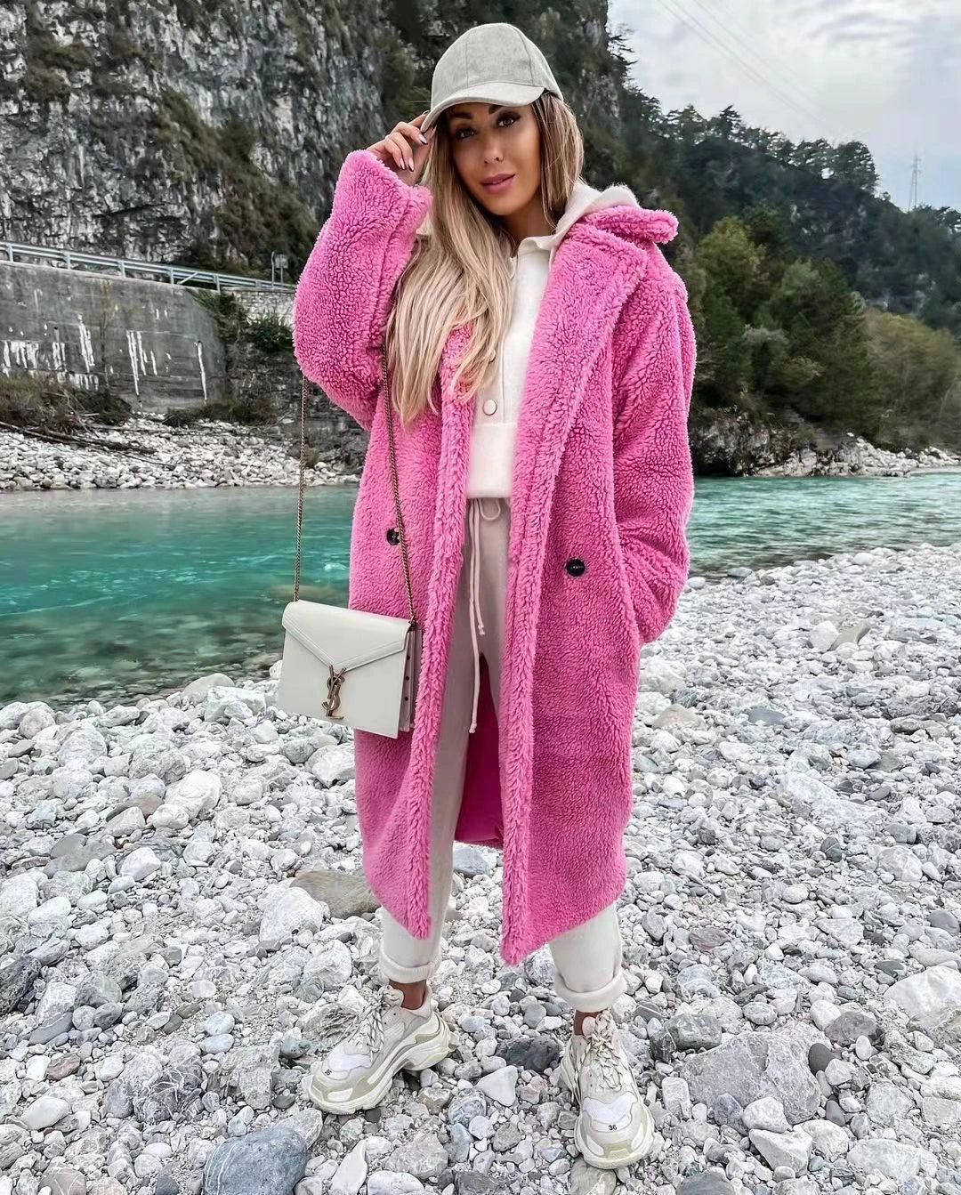 Stylish women's long fur coat with an irregular single-breasted design, available in a range of classic Kiwi-inspired colours