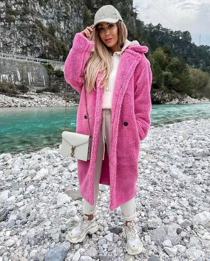 Stylish women's long fur coat with an irregular single-breasted design, available in a range of classic Kiwi-inspired colours