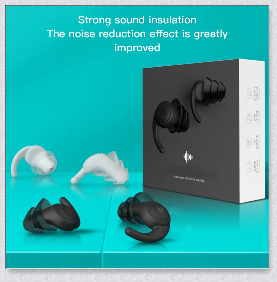 Pair of silicone ear plugs in black and white colors, designed for comfortable and effective noise reduction during sleep