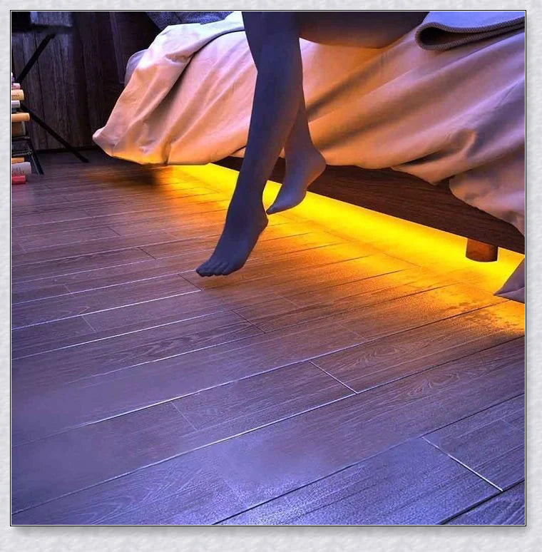 Cosy under-bed motion-activated LED light strip provides soft, guiding illumination in the dark