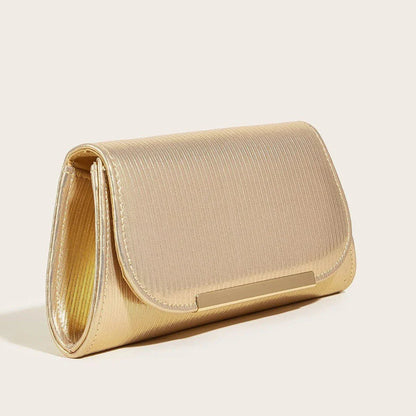 Elegant gold-colored striped PU leather clutch with detachable chain, perfect for Kiwi events and occasions