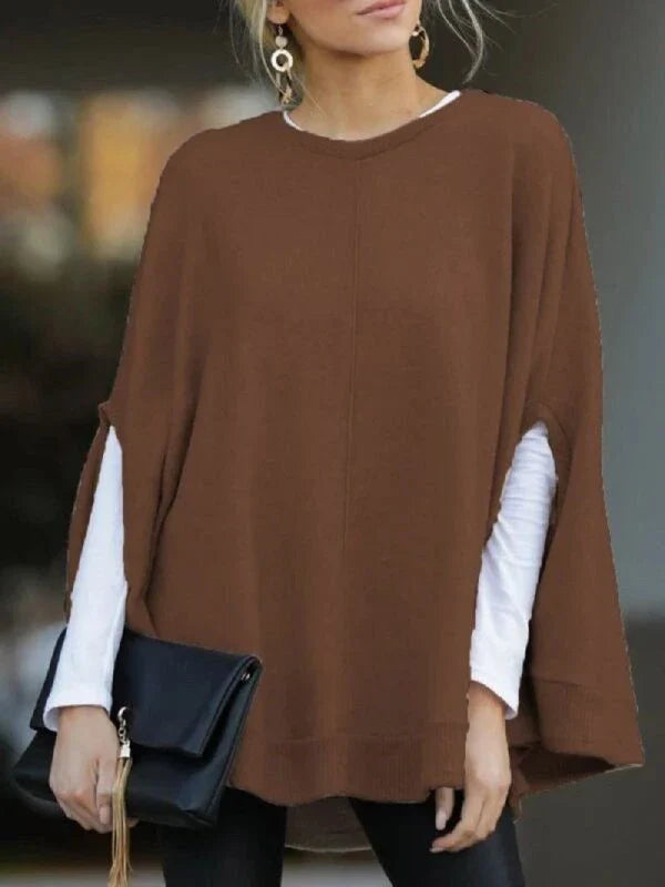 Cosy and relaxed bat-sleeve knit top poncho in a classic plain design, perfect for everyday Kiwi style