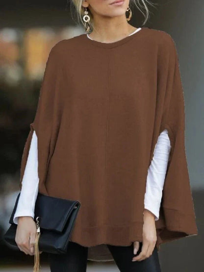 Cosy and relaxed bat-sleeve knit top poncho in a classic plain design, perfect for everyday Kiwi style