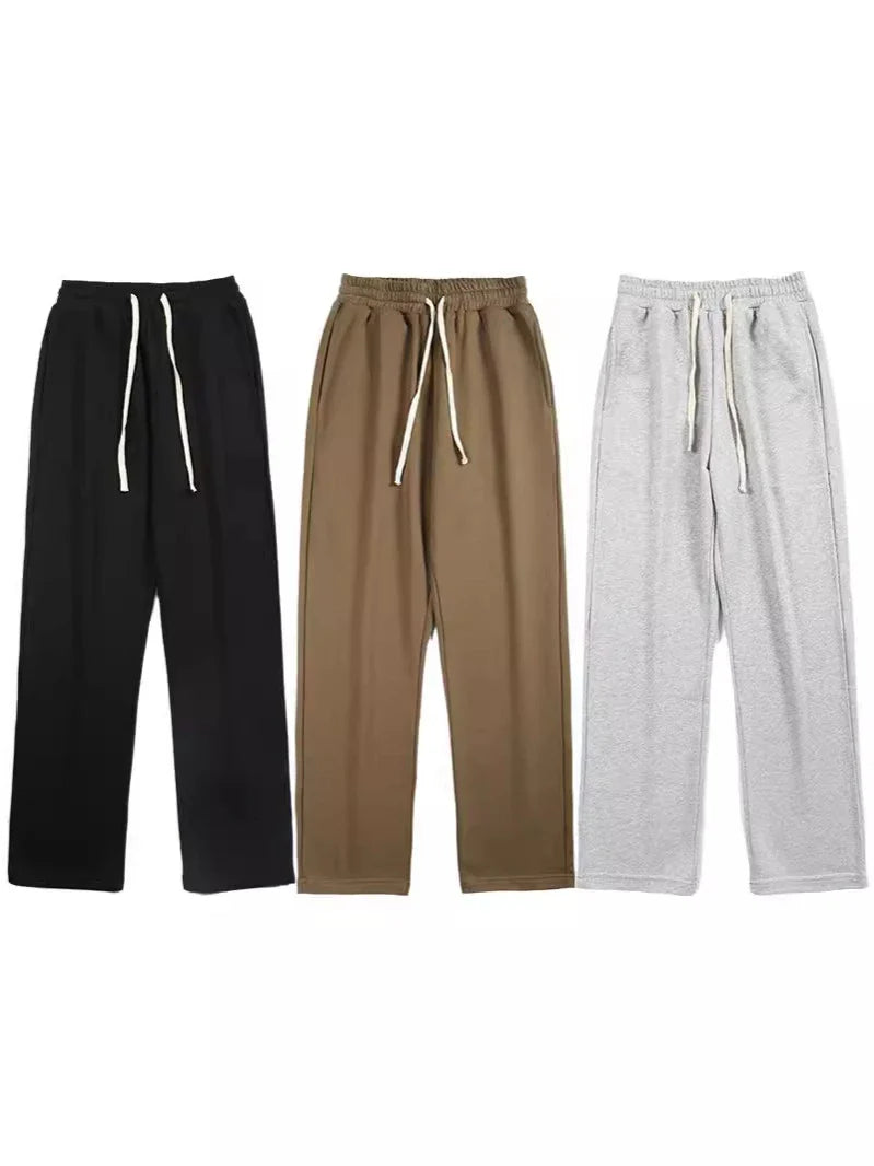 Straight gray sweatpants with a chic draping effect, perfect for Kiwi casual fashion