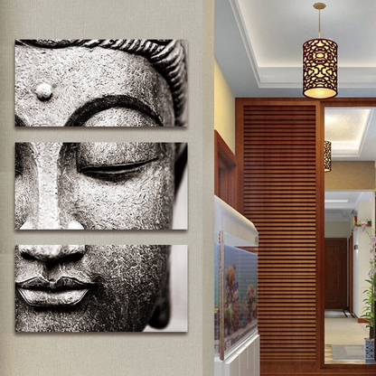 Serene 3-panel Buddha canvas wall art with a detailed, monochrome image of the Buddha's face