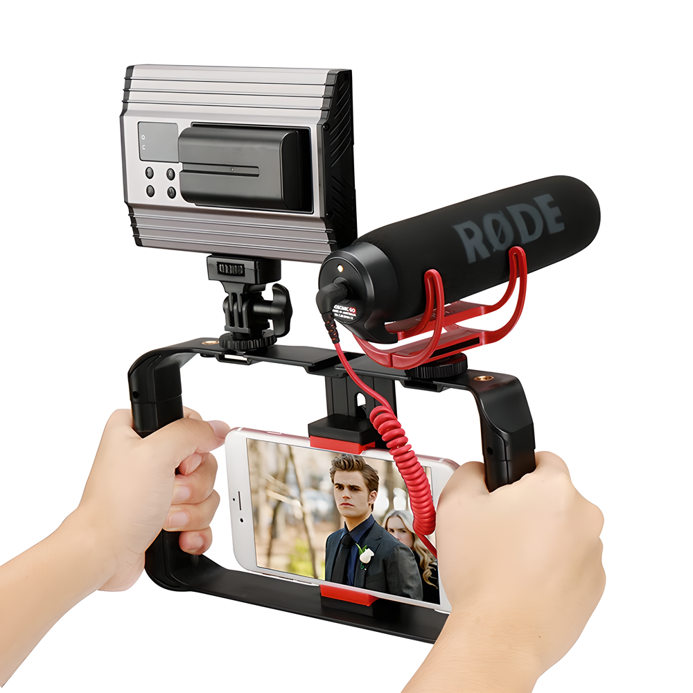 Smartphone video rig with accessories like LED light and microphone, providing stable and professional-grade filming capabilities